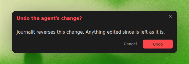 Undo the agent's change confirmation dialog explaining that Journalit reverses the change and leaves anything edited since as it is, with Cancel and Undo buttons